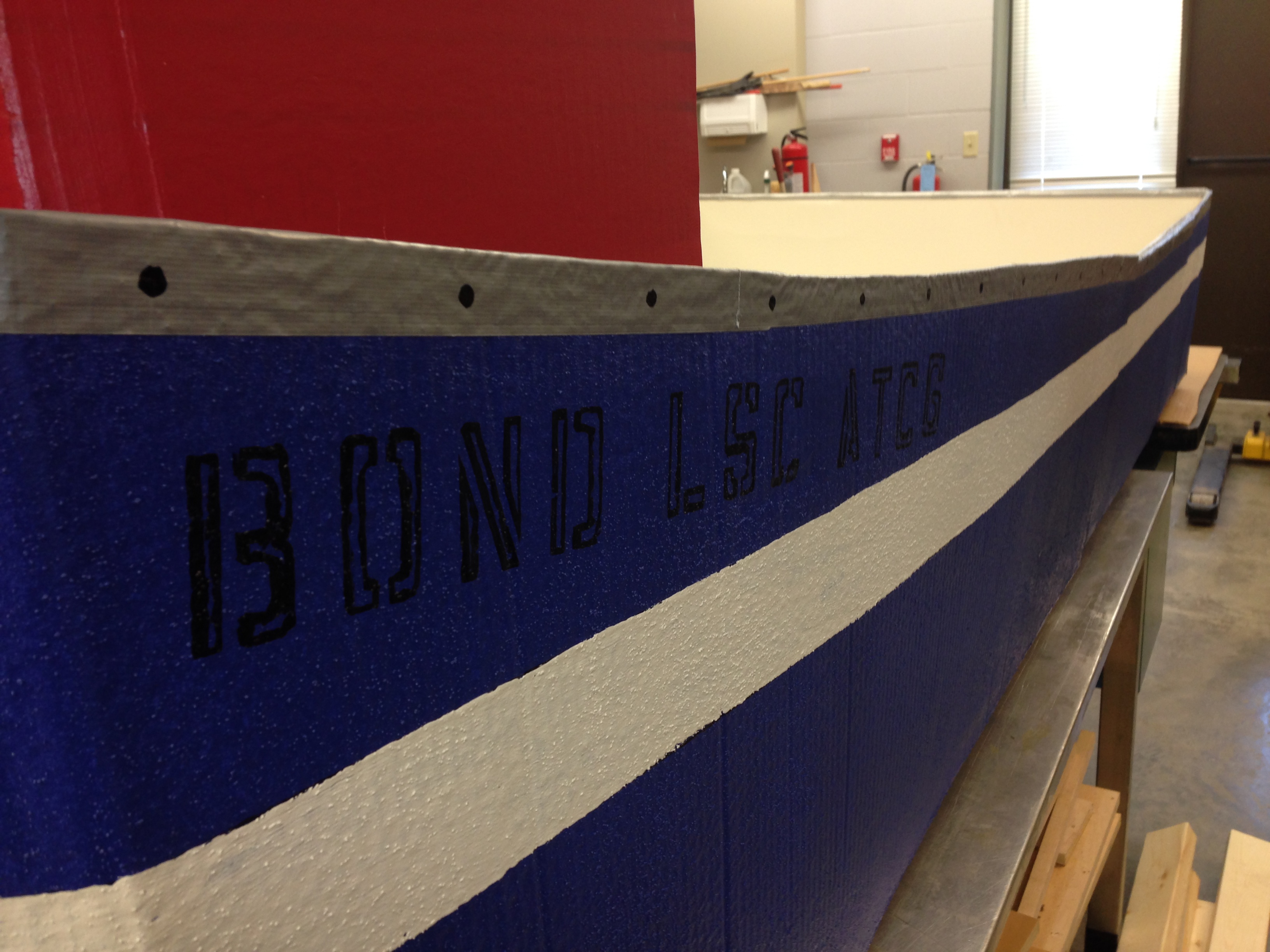 The Bond LSC ATCP is a streamlined, perfectly buoyant cardboard boat. ATCP are the letters of DNA sequencing. — BLANKENBUEHLER