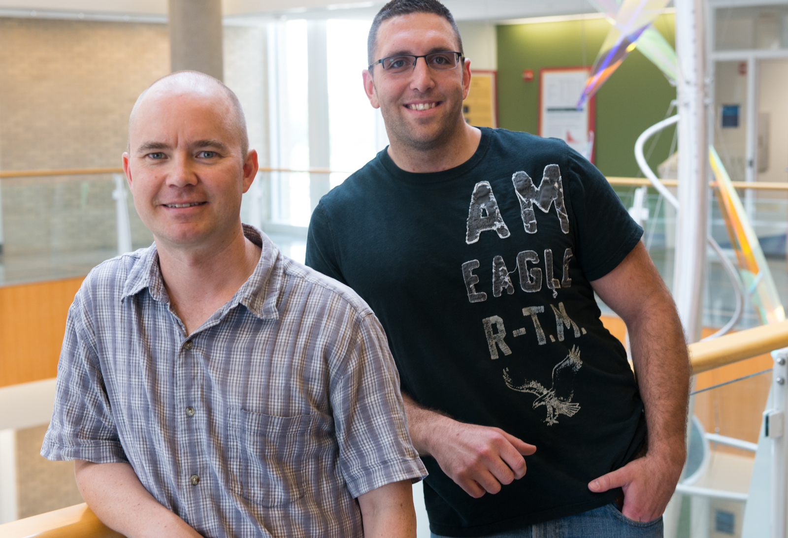 Marc Johnson (left) with a post doctoral student that works in his lab. The lab does important research on the basic function and mechanisms of viral navigation and transport.