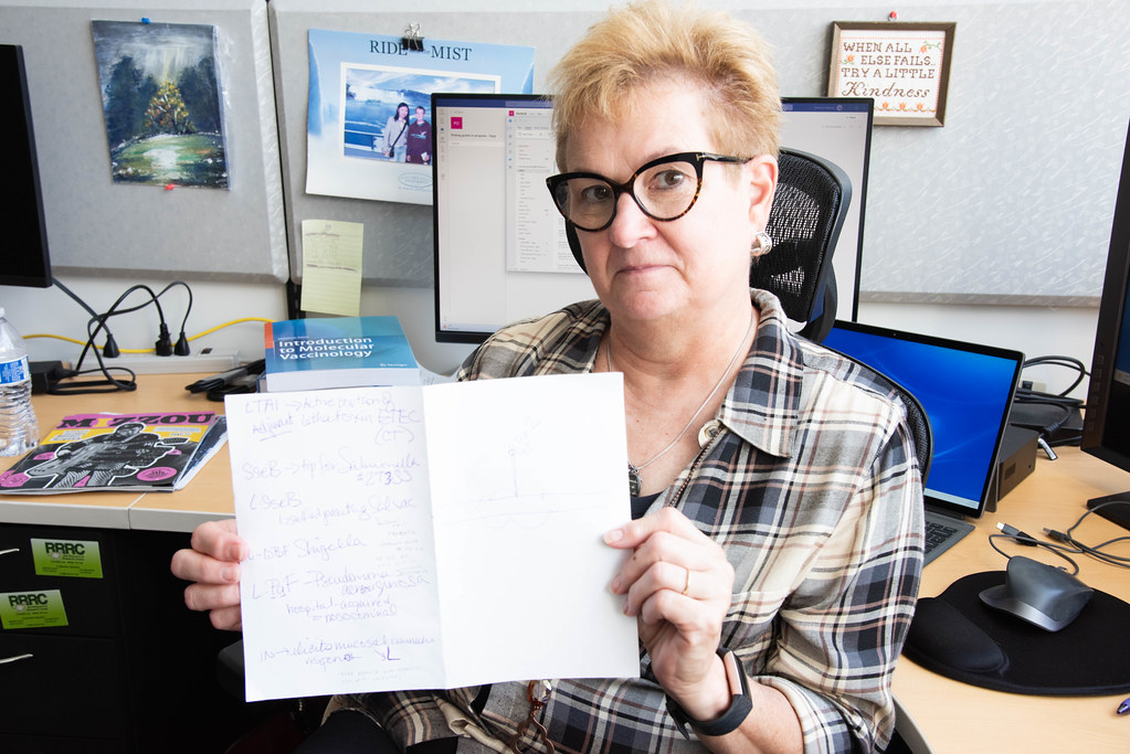 Wendy Picking holds up a piece of paper. 