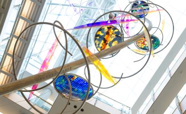 Joy of Discovery sculpture hanging in McQuinn Atrium of the Bond Life Sciences Center.