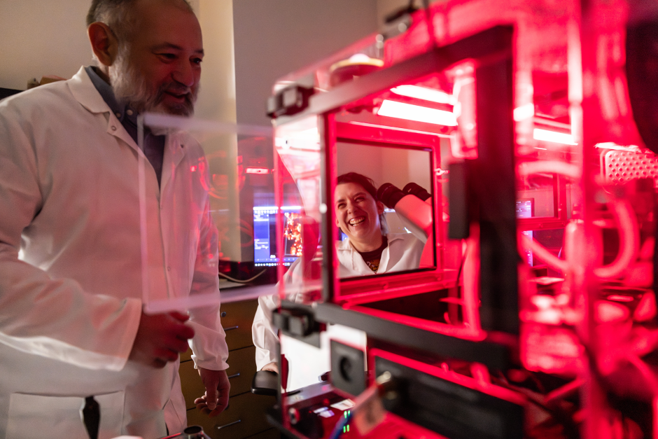 Researchers using the equipment in the Advanced Light Microscopy Core.